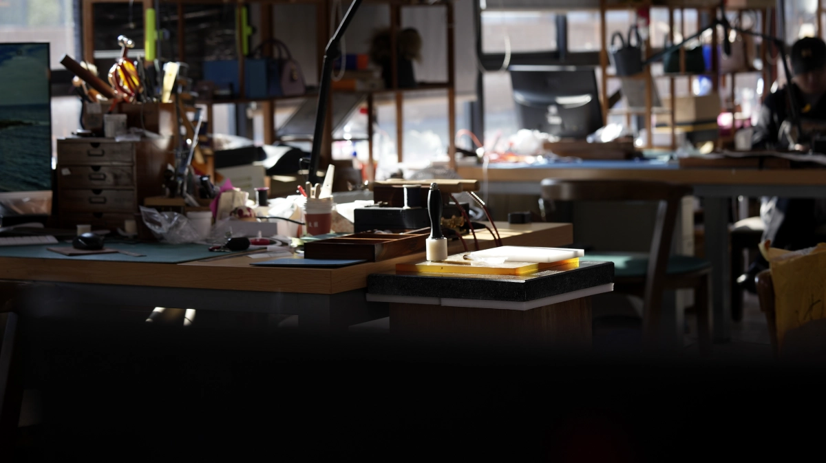 SYMONHO Leathercraft Studios background