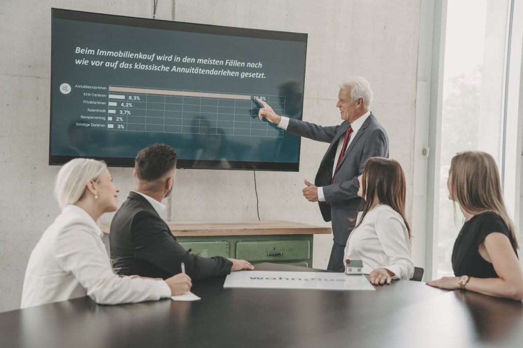 wohnplus Immobilien Hintergrund