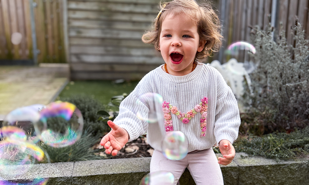 Kids 'n Stitchs achtergrond